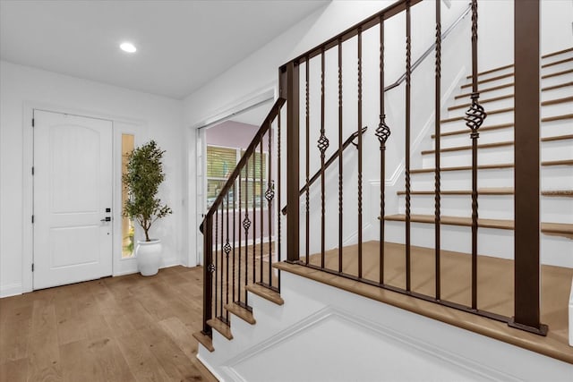 entrance foyer featuring hardwood / wood-style floors