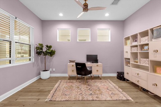 office area with ceiling fan and light hardwood / wood-style flooring