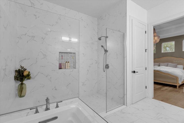 bathroom featuring a tile shower