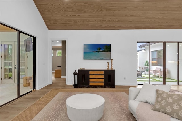 living room with lofted ceiling, wood-type flooring, and wooden ceiling