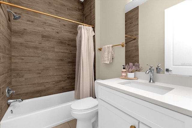 full bathroom featuring vanity, shower / tub combo, and toilet