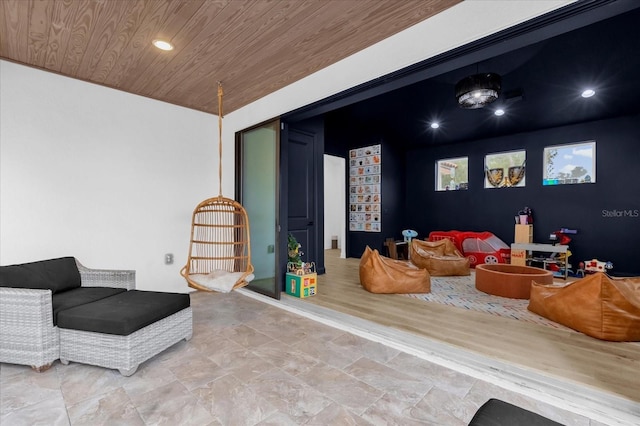 sitting room featuring wood ceiling