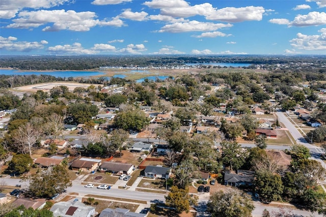 birds eye view of property featuring a residential view and a water view