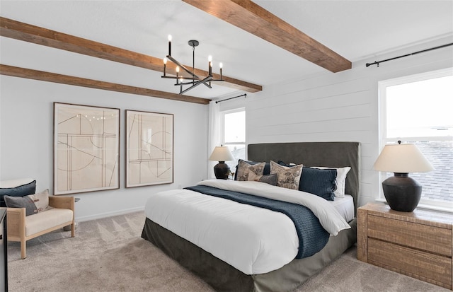 bedroom with light carpet, beam ceiling, and a chandelier