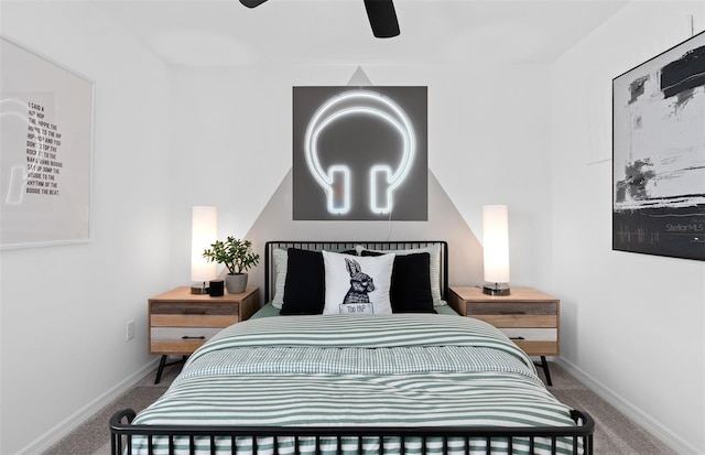 bedroom with ceiling fan and carpet flooring