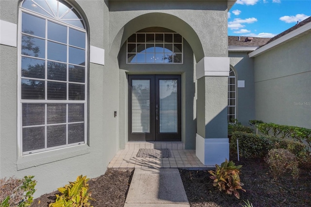 doorway to property featuring french doors