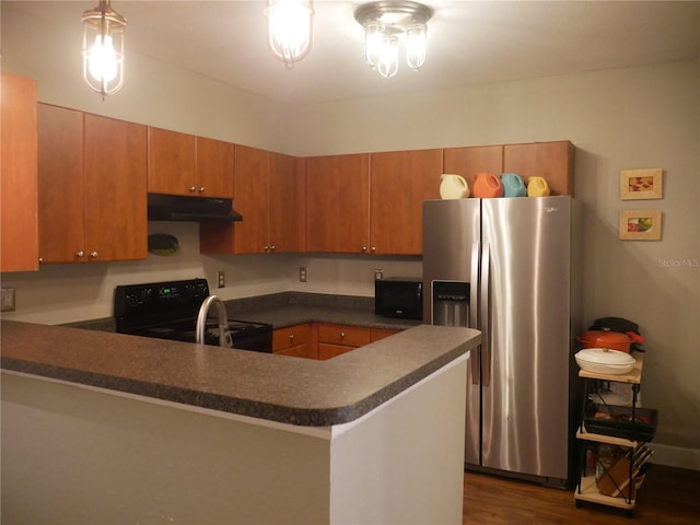 kitchen featuring stainless steel refrigerator with ice dispenser, dark hardwood / wood-style flooring, black electric range oven, and kitchen peninsula