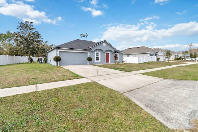 ranch-style house with a garage and a front yard