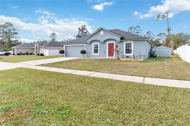 single story home featuring a garage and a front yard