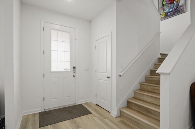 foyer entrance featuring light hardwood / wood-style floors