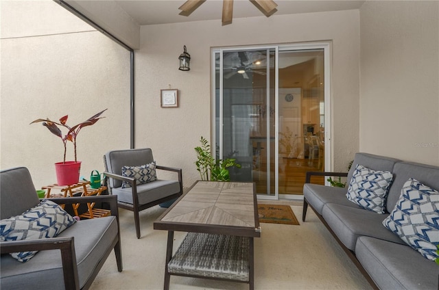 view of patio featuring an outdoor hangout area and ceiling fan