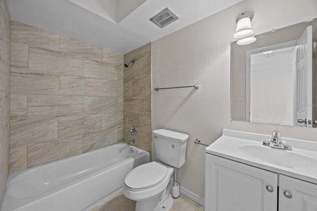 full bathroom featuring vanity, toilet, and tiled shower / bath combo