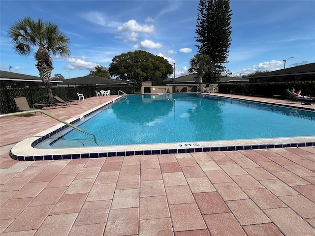 view of pool featuring a patio area