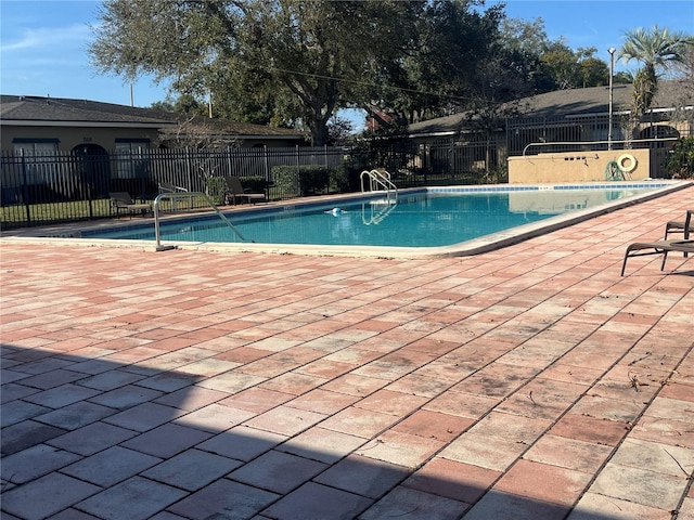 view of pool featuring a patio area