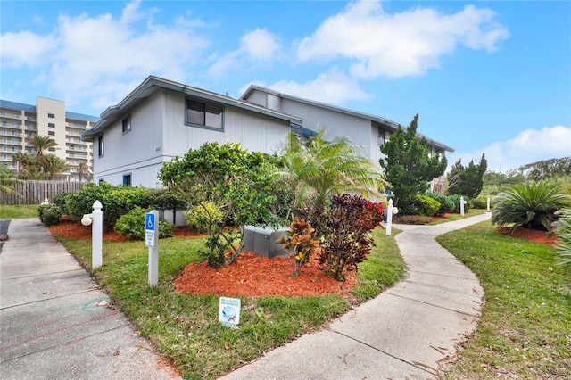 exterior space with a front yard