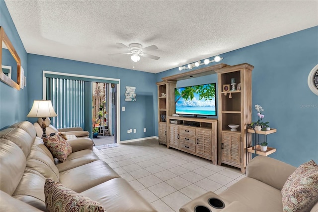 tiled living room with a textured ceiling and ceiling fan