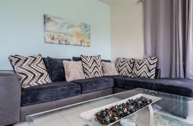 living room featuring tile patterned flooring