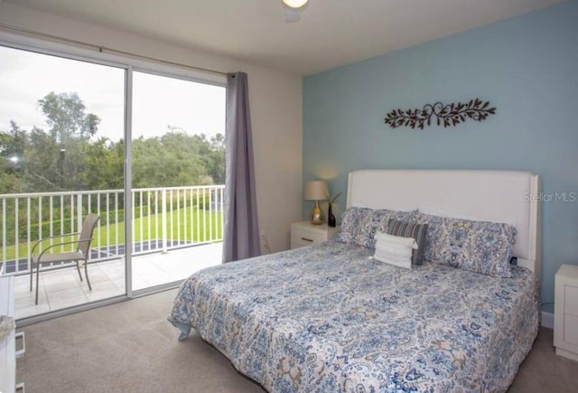 bedroom featuring carpet flooring and access to exterior