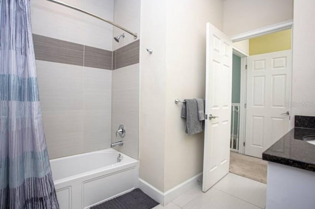 bathroom featuring shower / tub combo, vanity, and tile patterned floors