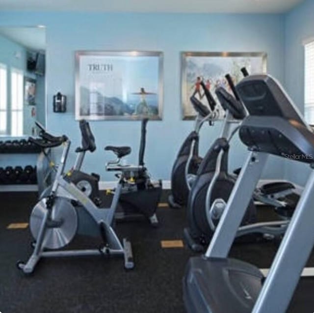 exercise room featuring a healthy amount of sunlight