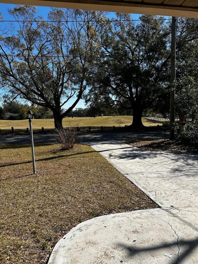 exterior space with a front yard