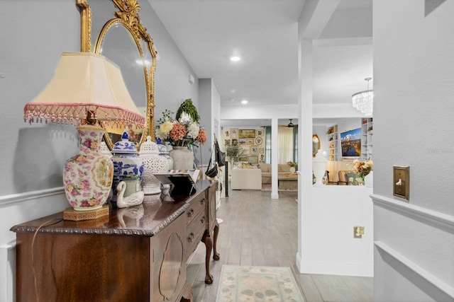 corridor featuring light hardwood / wood-style floors