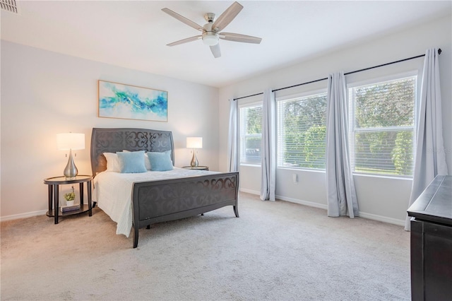 bedroom featuring carpet flooring, ceiling fan, and baseboards