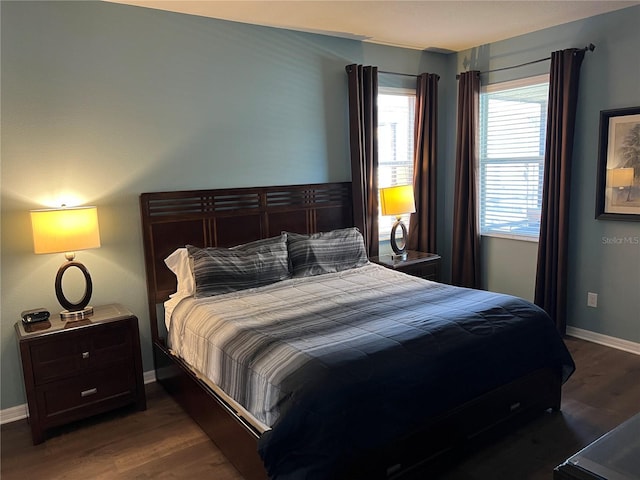 bedroom featuring dark wood-type flooring