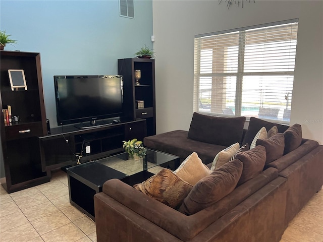 living room with light tile patterned flooring