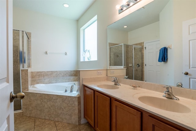 bathroom featuring vanity, separate shower and tub, and tile patterned floors