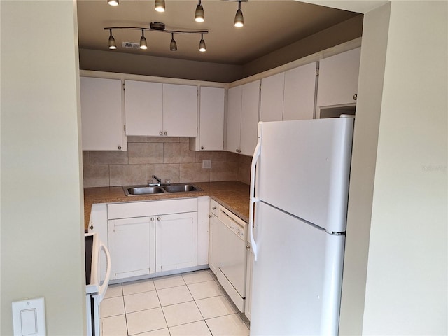 kitchen featuring white cabinetry, sink, white appliances, and decorative backsplash