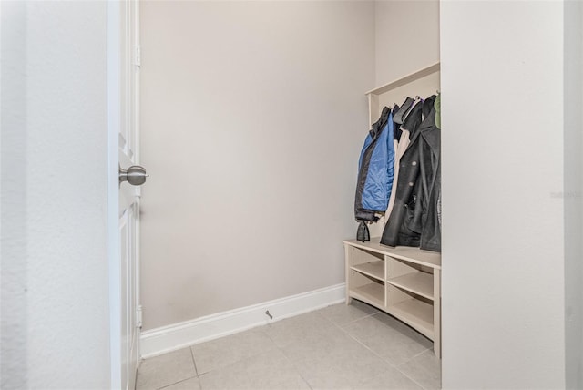 mudroom with light tile patterned flooring