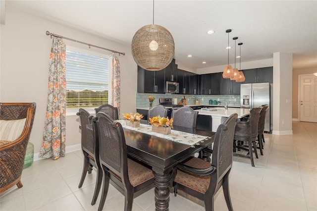 dining room featuring light tile patterned floors