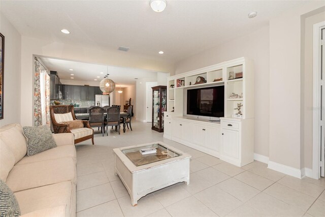 living room featuring light tile patterned floors