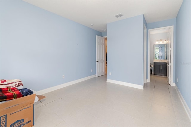 bedroom featuring ensuite bathroom