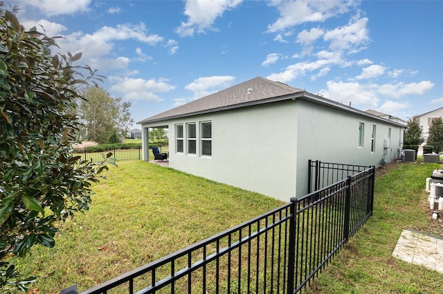 view of property exterior featuring a lawn