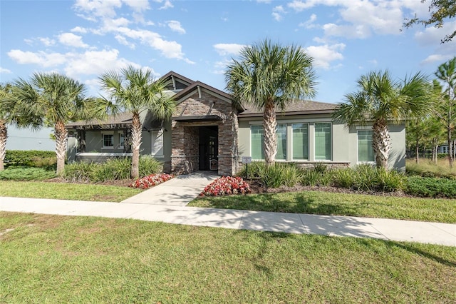 view of front of home featuring a front yard