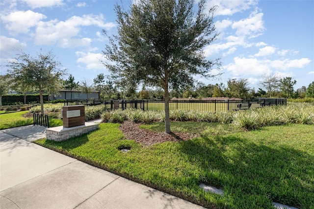 surrounding community featuring a lawn