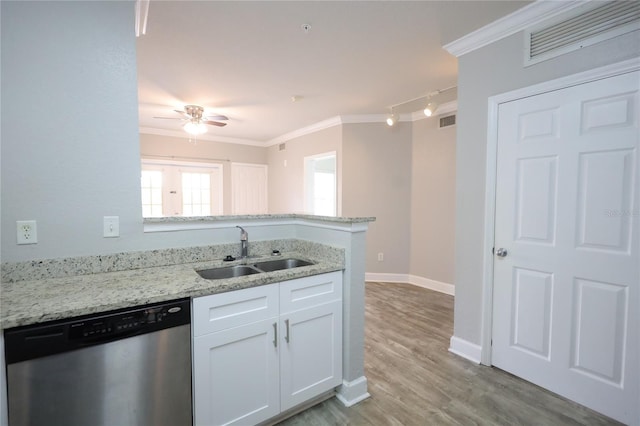 kitchen with white cabinetry, dishwasher, sink, and ornamental molding