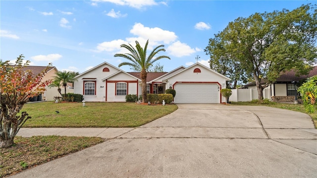 single story home with a garage and a front lawn