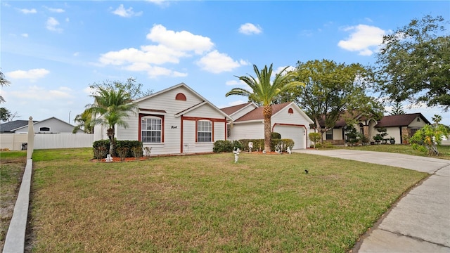 single story home with a garage and a front lawn