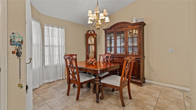 dining room featuring a chandelier and light tile patterned floors