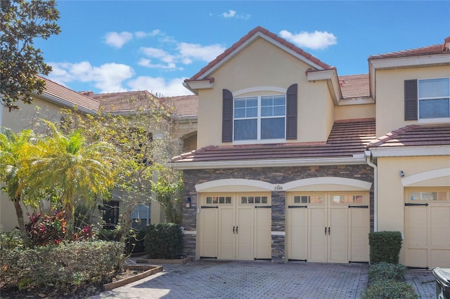 view of front of home with a garage