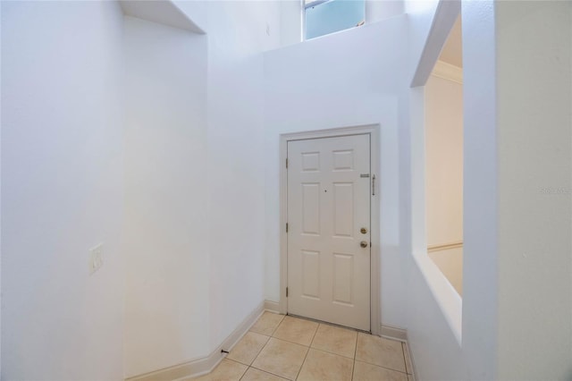 entryway featuring light tile patterned floors