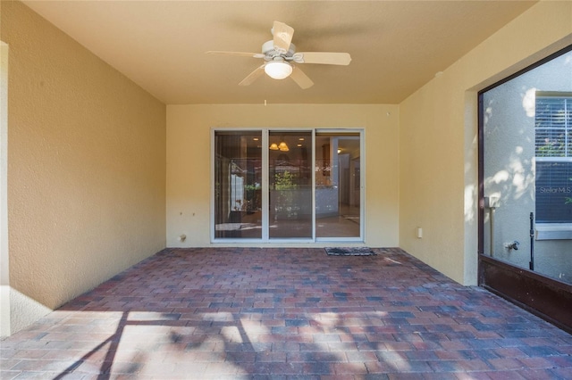 view of patio / terrace featuring ceiling fan