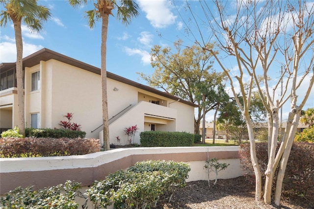 view of home's exterior featuring a balcony