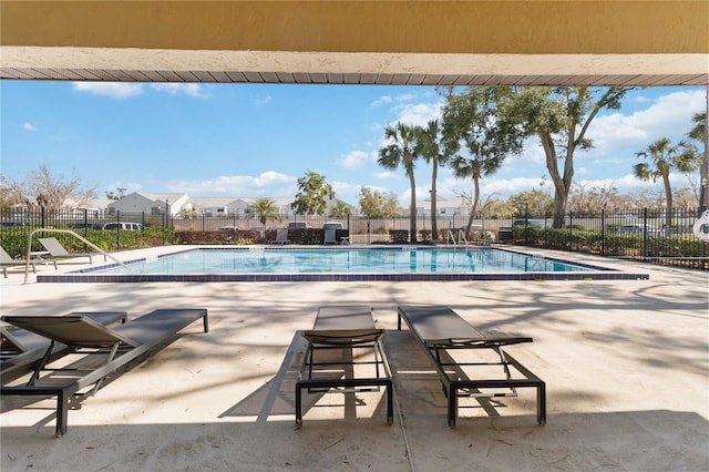 view of pool featuring a patio area