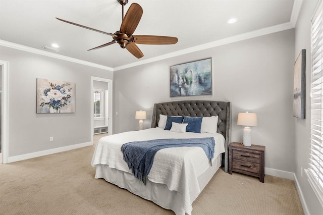 carpeted bedroom featuring ornamental molding and ceiling fan