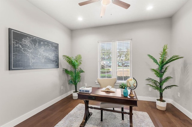 office with dark hardwood / wood-style floors and ceiling fan