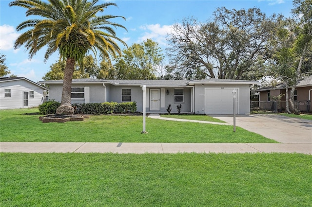 ranch-style house with stucco siding, an attached garage, driveway, and a front lawn